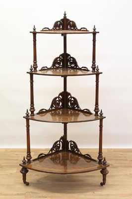 Lot 1433 - Victorian inlaid burr walnut veneered bow front four tier corner whatnot with finely pierced scroll brackets and turned supports on original ceramic castors