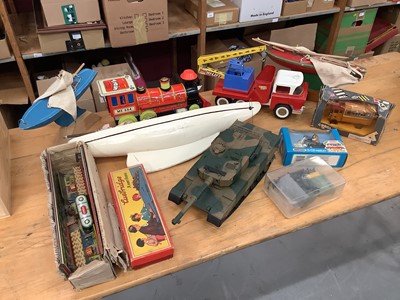 Lot 1875 - Chinese tinplate loco in original box, Tinplate crane, wooden yachtsie tanks and other toys