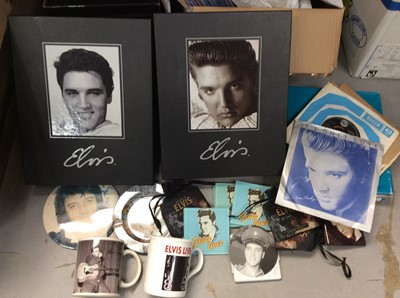 Lot 447 - Large collection of Elvis memorabilia, including records, stamps, clocks, printed materials etc