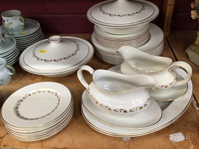 Lot 541 - Royal Doulton Fairfax dinner ware with two tureens, two sauce boats, serving platters, dinner and tea plates, plus Buchan tea ware and opaque glazed tea ware.