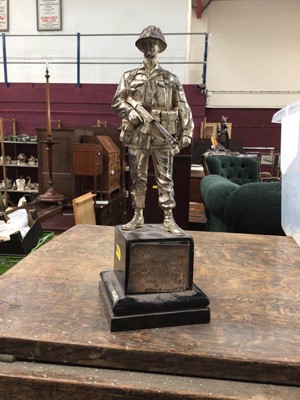 Lot 108 - Military interest: white metal figure of a Royal Anglian Officer, on plinth base with engraved silver plaque, 30cm high
