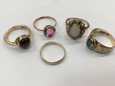 Lot 712 - Five gold and gem-set dress rings