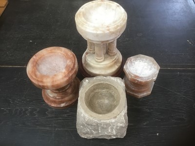 Lot 134 - Group of four carved stone fonts