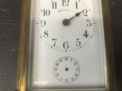 Lot 139 - Late 19th / early 20th century brass carriage clock, indistinctly signed Hamilton & Co., with subsidiary alarm dial