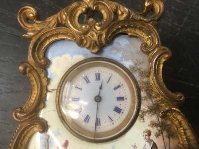 Lot 140 - Late 19th / early 20th century French painted porcelain catouche shaped clock