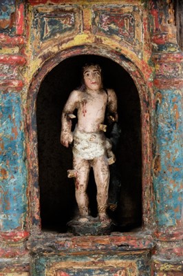 Lot 742 - 18th / 19th century Continental polychrome painted deity figure of Saint Sebastian, presented in portable shrine.