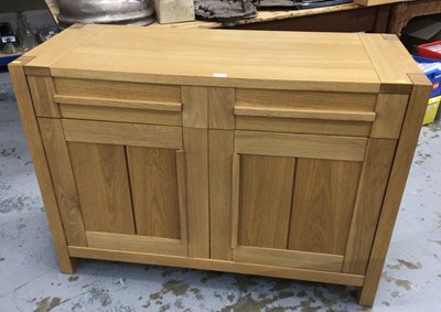 Lot 862 - Contemporary light oak sideboard with two draws above two panelled doors