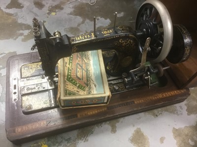 Lot 349 - Early 20th century sewing machine in walnut and marquetry case