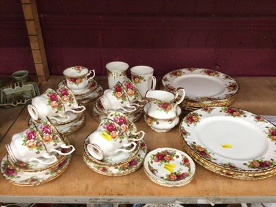 Lot 549 - Royal Albert Old Country Roses dinner and tea service comprising 10 dinner plates, 10 side plates, 10 saucers, 9 tea cups, 1 jug, 2 sugar bowls, 2 mugs, 2 plant stands and an address book