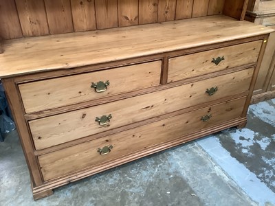 Lot 964 - Antique pine two height kitchen dresser with shelves above and two short and two long drawers