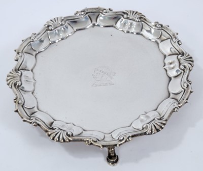 Lot 248 - George II silver waiter of circular with engraved armorial.