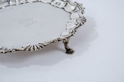Lot 248 - George II silver waiter of circular with engraved armorial.