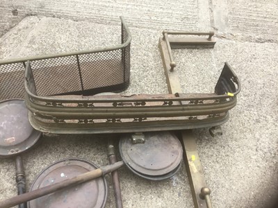 Lot 252 - Three brass fenders, bed pans and a trivet