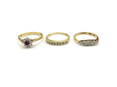 Lot 678 - Three 18ct gold rings