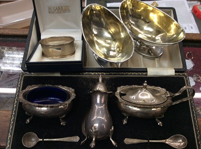 Lot 750 - Silver three piece cruet set in fitted case, pair silver bon bon dishes and silver napkin ring