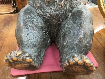 Lot 734 - Late 19th / early 20th century Black Forest carved linden wood bear occasional table