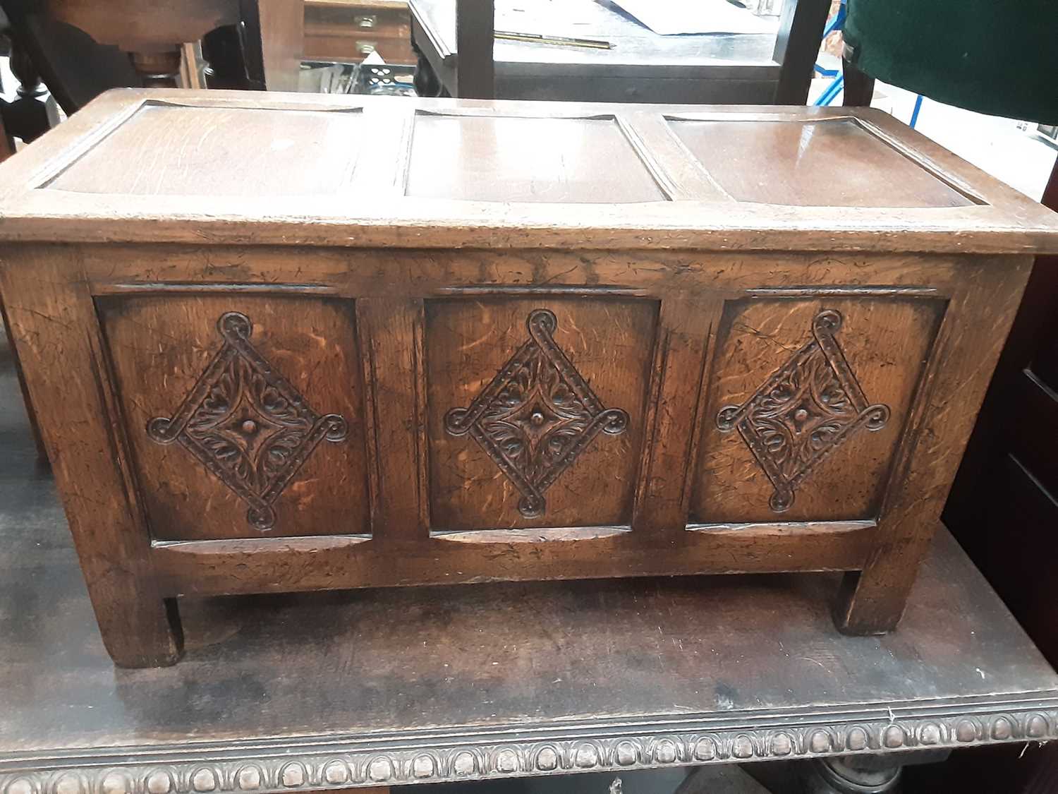 Lot 872 - Small 17th century style carved and panelled oak coffer