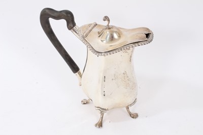 Lot 261 - Edwardian silver hot water jug