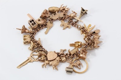 Lot 483 - 9ct gold charm bracelet