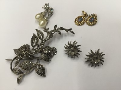 Lot 685 - Large silver and marcasite floral spray brooch, pair of silver and marcasite flower earrings, and two pairs of costume earrings