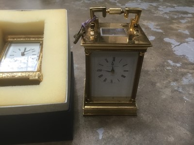 Lot 174 - Large brass carriage clock by Matthew Norman, London together with a boxed carriage clock by Matthew Norman