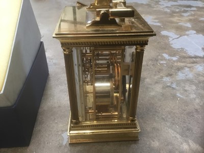 Lot 174 - Large brass carriage clock by Matthew Norman, London together with a boxed carriage clock by Matthew Norman