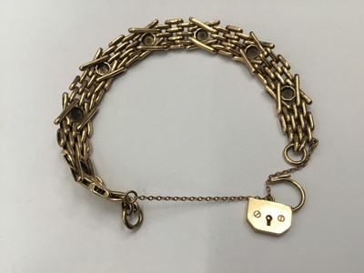 Lot 691 - 9ct gold gate bracelet with padlock clasp