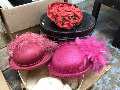 Lot 34 - A box of linen, together with vintage pairs of kid gloves, three vintage ladies hats in a Scott's hat box, and two collapsible top hats in a tin hat box