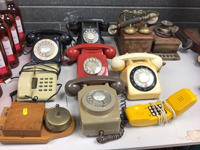 Lot 265 - Vintage black Bakelite telephone together with a collection of other vintage coloured telephones