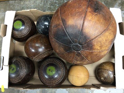 Lot 270 - Two boxes of treen and sundries to include carpet bowls (2 boxes)
