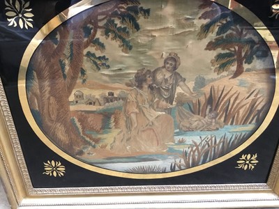 Lot 229 - George III needlework and silk picture depicting baby Moses in the cradle, in original verre églomisé glazed gilt frame