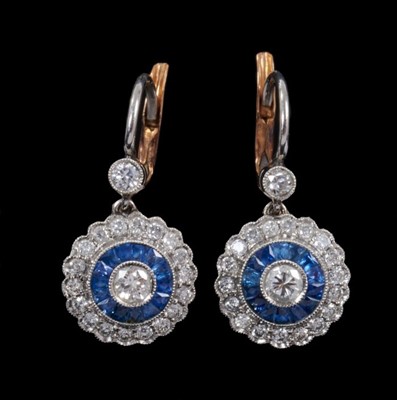 Lot 459 - Pair of diamond and sapphire cluster pendant earrings