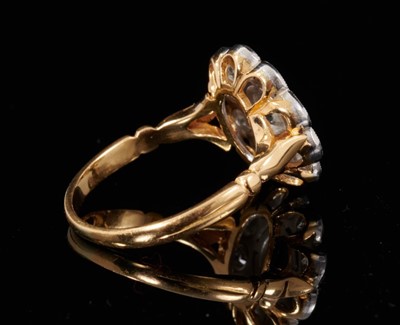 Lot 462 - Diamond cluster ring with a flower head cluster of eleven brilliant cut diamonds