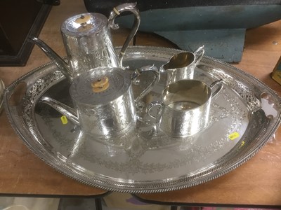 Lot 408 - Four piece Victorian silver plated tea set, together with an ornate pierced silver plated oval tray