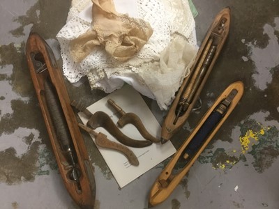 Lot 422 - Three antique treen knitting sheaths, together with three shuttles and collection of lacework and other textiles