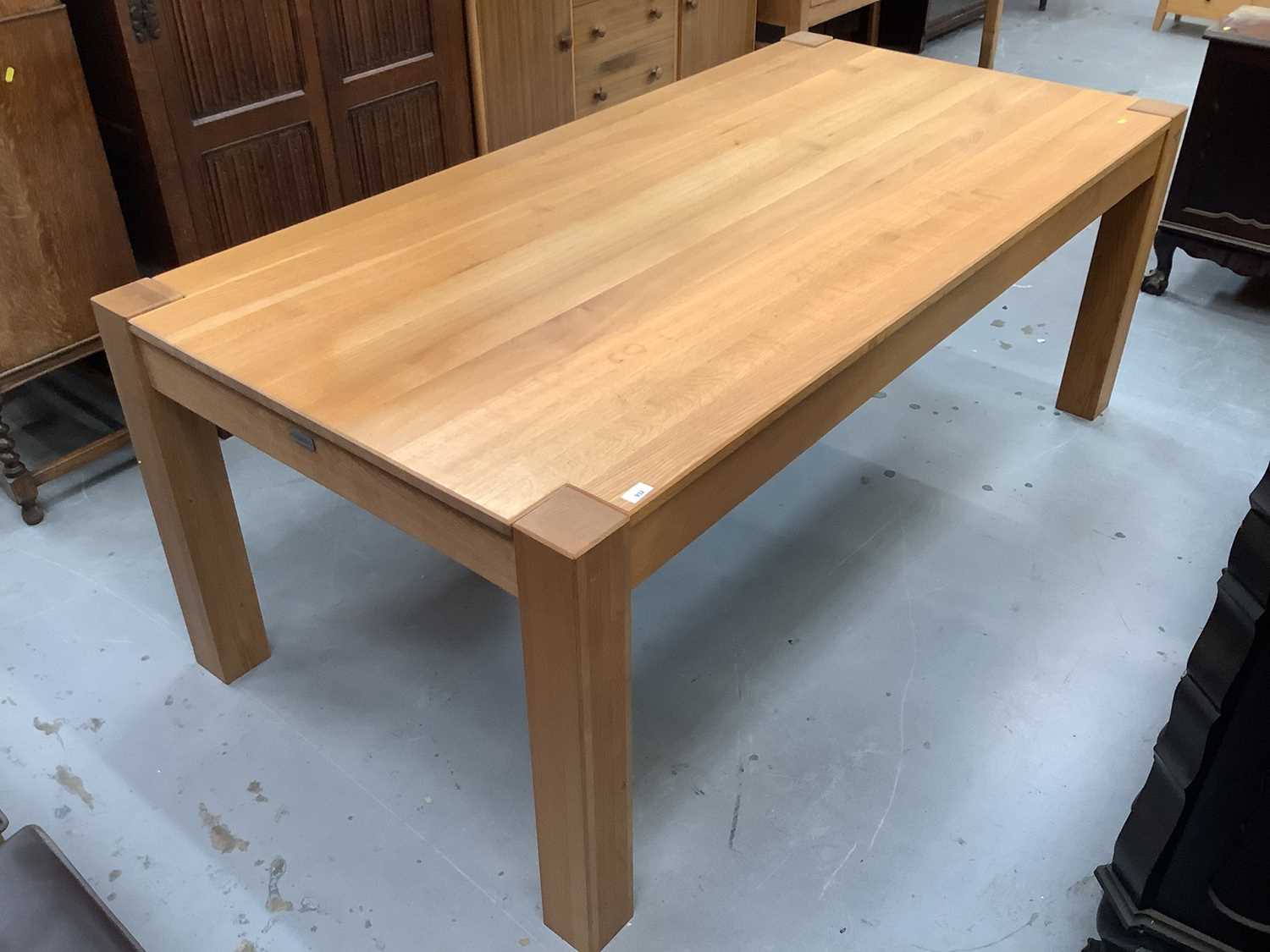Lot 932 - Good quality light oak dining table bearing label - John Laurence, Fine Wooden Furniture, 200.5cm x 99cm x 88.5cm high