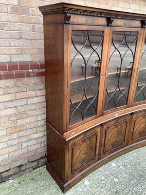 Lot 939 - Good quality Georgian style mahogany concave fronted two height with three astragal glazed doors above, and three cupboards below, 178cm wide, 43.5cm deep, 183cm high