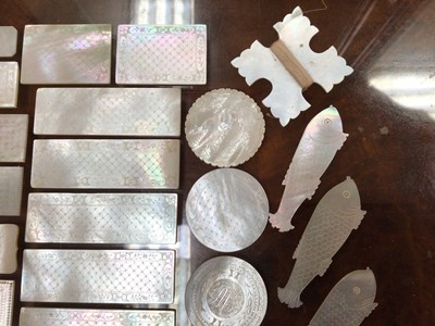 Lot 384 - Selection of Mother of Pearl engraved counters (30)