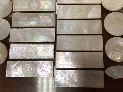 Lot 384 - Selection of Mother of Pearl engraved counters (30)