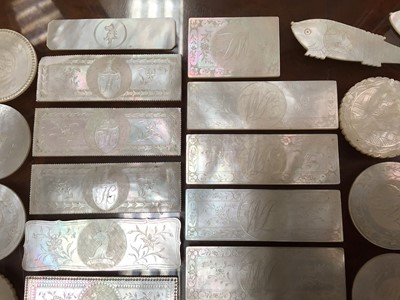 Lot 384 - Selection of Mother of Pearl engraved counters (30)