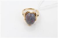 Lot 1537 - Opal single stone ring set with an oval...