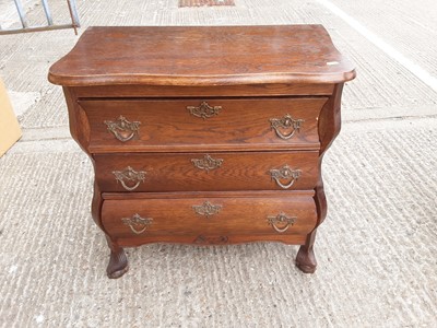 Lot 971 - Two Dutch oak bedside chests of three drawers