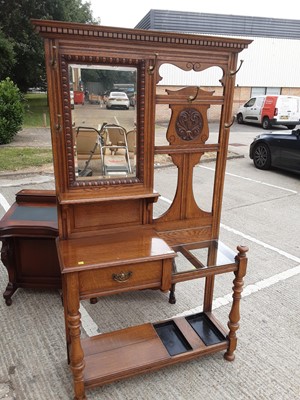 Lot 970 - Edwardian carved light oak hall stand