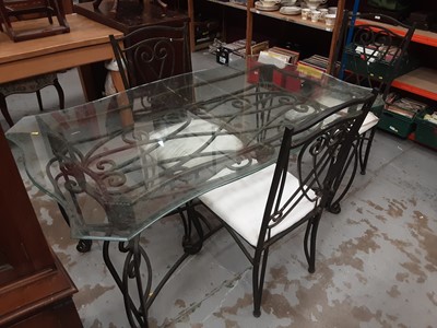 Lot 967 - Contemporary glass and wrought iron dining table and three matching chairs