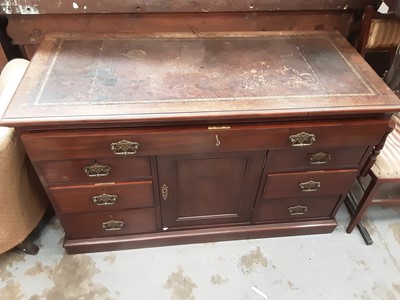 Lot 1154 - Good quality Edwardian walnut desk with leather lined top, fitted secretaire drawer and central cupboard below flanked by six short drawers, 127cm wide, 57cm deep, 79cm high