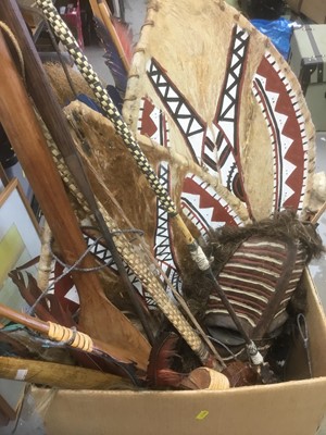 Lot 323 - Large quantity of tribal items - headdresses, spears etc