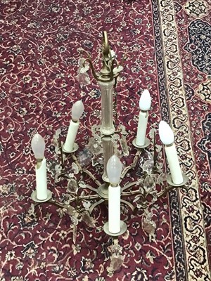 Lot 581 - Brass chandelier with prismatic glass drops (several drops loose), total height 53cm