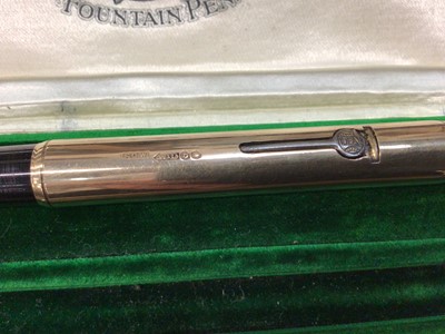 Lot 730 - Early 20th century 9ct gold Waterman's fountain pen with a 9ct gold mounted body, hallmarked London 1917, in original velvet lined tooled green leather box