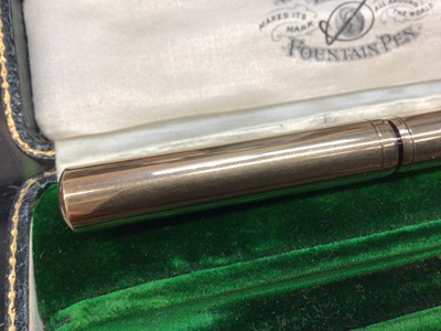 Lot 730 - Early 20th century 9ct gold Waterman's fountain pen with a 9ct gold mounted body, hallmarked London 1917, in original velvet lined tooled green leather box
