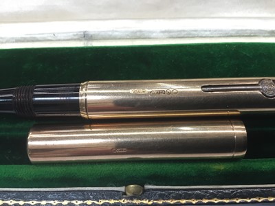 Lot 730 - Early 20th century 9ct gold Waterman's fountain pen with a 9ct gold mounted body, hallmarked London 1917, in original velvet lined tooled green leather box